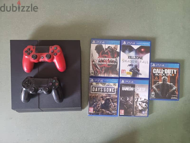 PS4 500GB with 2 controllers and 5 Games 0