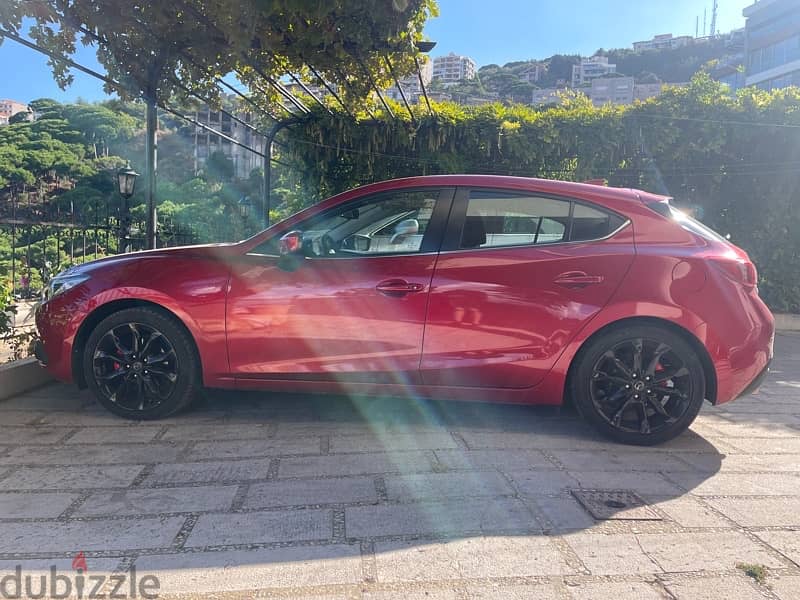 Mazda 3 2016 - Hatchback - Mazda Red colour - Excellent condition 5