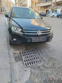 vw tiguan   black 2012 panoramic roof. picanto 2014