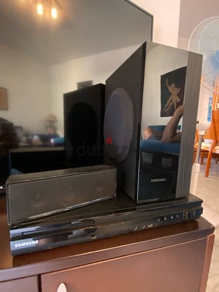 surround system +DVD player + speaker 1