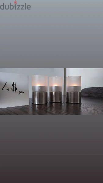 3 small candle holders 0