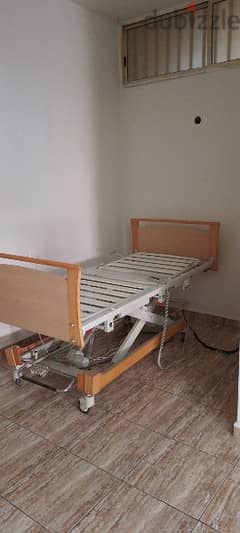 Electronic bed for disabled people