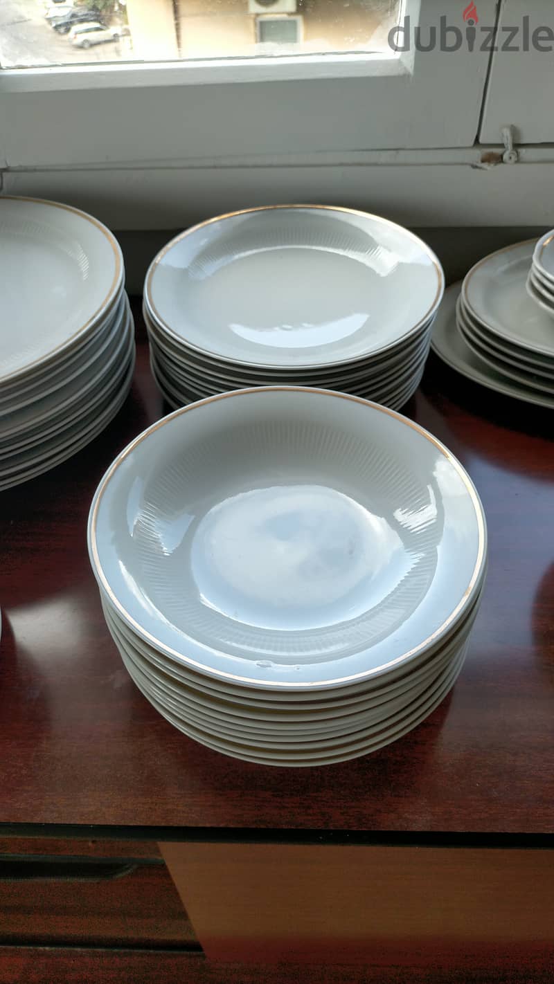 Dinner Service of Plates, Bowls, Cups and Cutlery 3