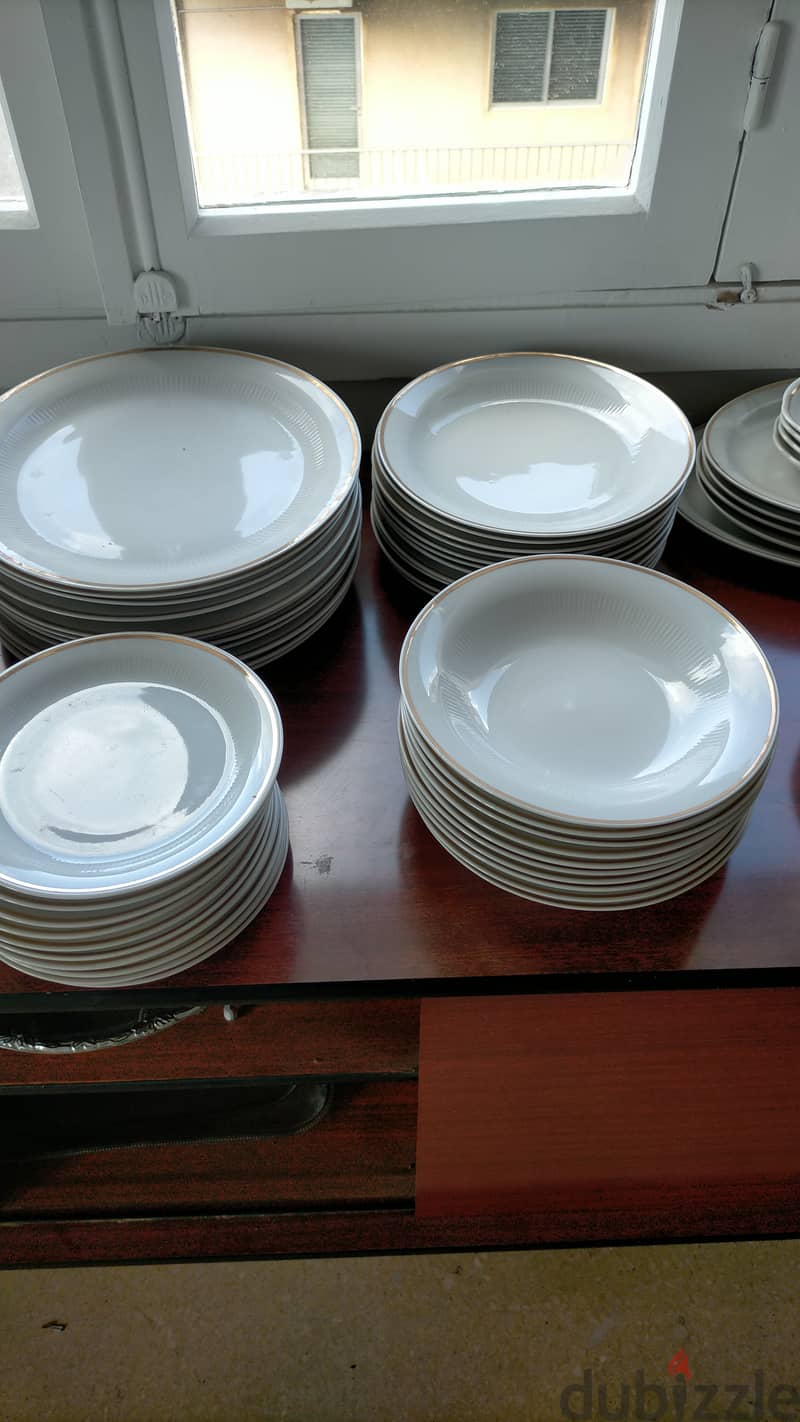 Dinner Service of Plates, Bowls, Cups and Cutlery 4