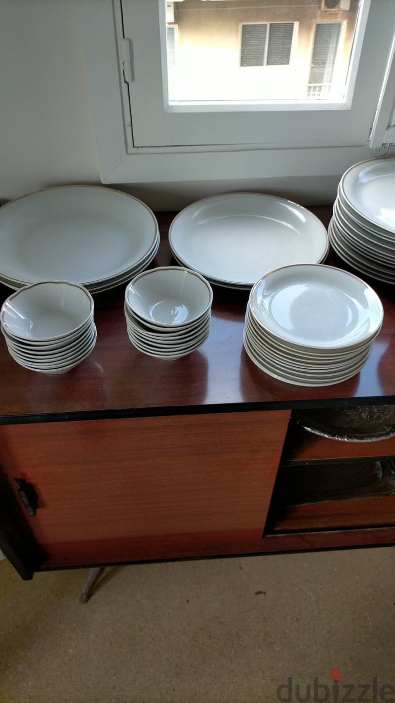 Dinner Service of Plates, Bowls, Cups and Cutlery 5