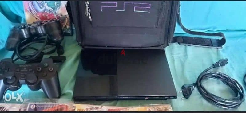 Ps2 slim + 10 games of ur choice and wireless controller 1