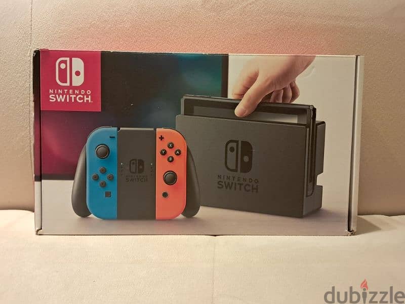 Nintendo switch  with controller and 4 games 1