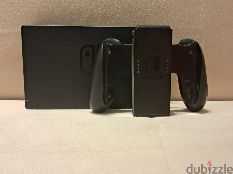 Nintendo switch  with controller and 4 games 4