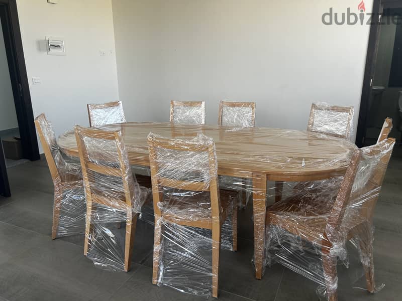 Dinning table and chairs 0