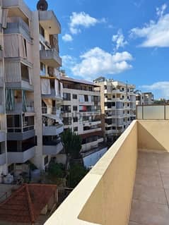 A rooftop apartment with open view for rent in Mazraat yachouh.