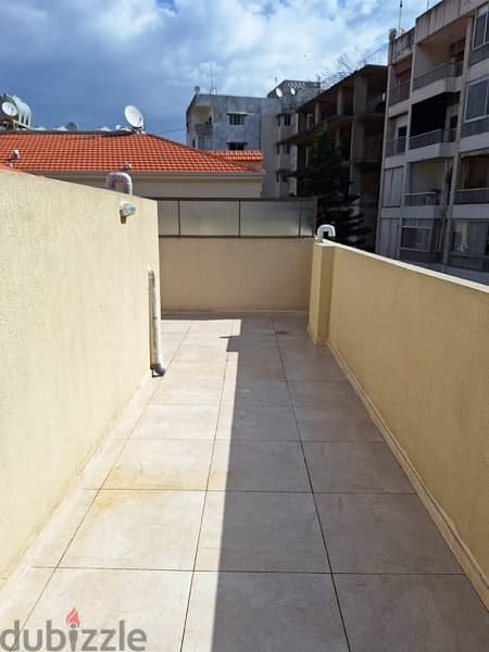 A rooftop apartment with open view for rent in Mazraat yachouh. 3