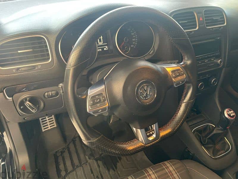 Volkswagen Golf GTI 2014 look R ajnabiye tesjila 3al adim r5is Top car 12