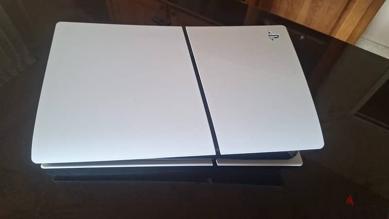 Ps5 digital slim with 2 controllers (barely used) 2