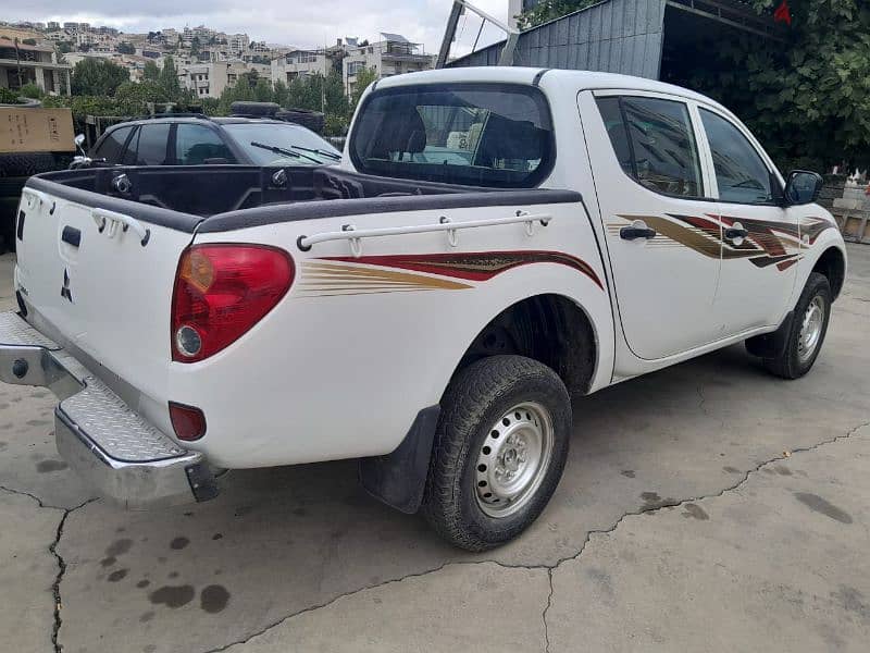 Mitsubishi L200 2015 بداعي السفر 4