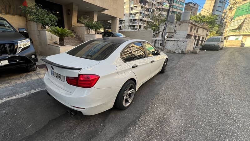 BMW 3-Series 328 2012 with special number 1