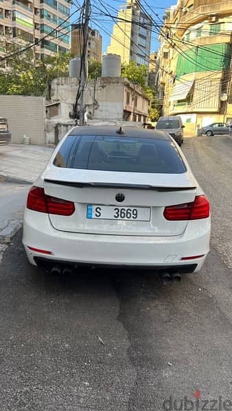 BMW 3-Series 328 2012 with special number 2