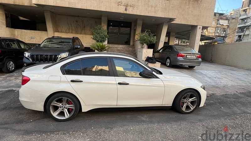 BMW 3-Series 328 2012 with special number 6