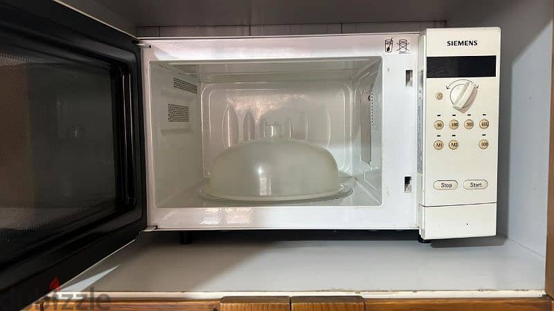 freezer + microwave used like new 350 $ 1