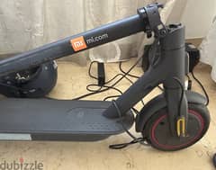 Xiaomi scooter pro 2 with box and charger + Carrera Helmet