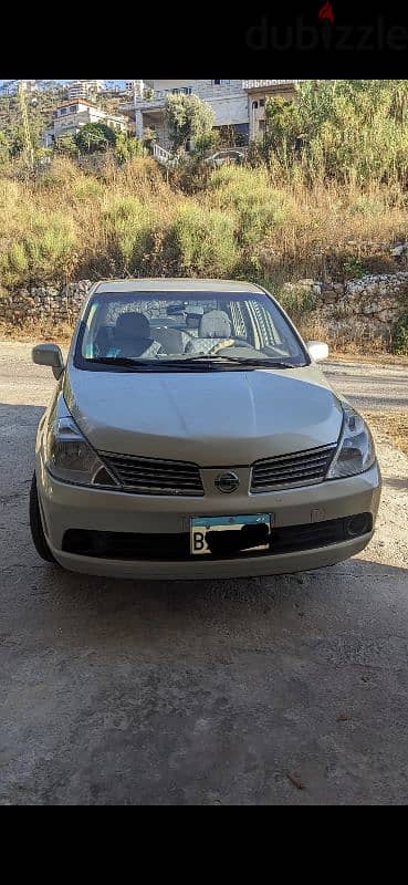 Nissan Tiida 2010 خارقة النظافة 0