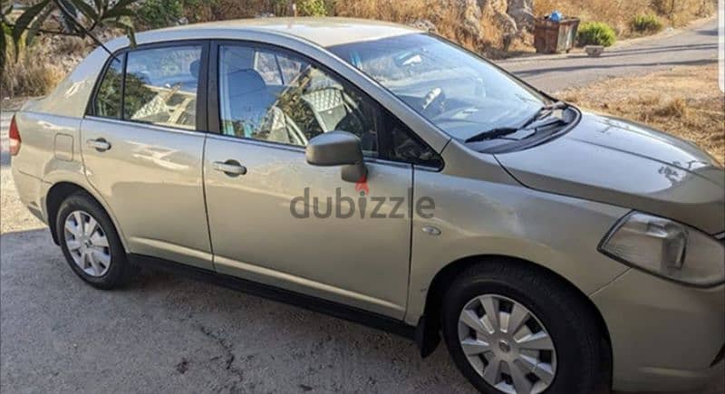 Nissan Tiida 2010 خارقة النظافة 1