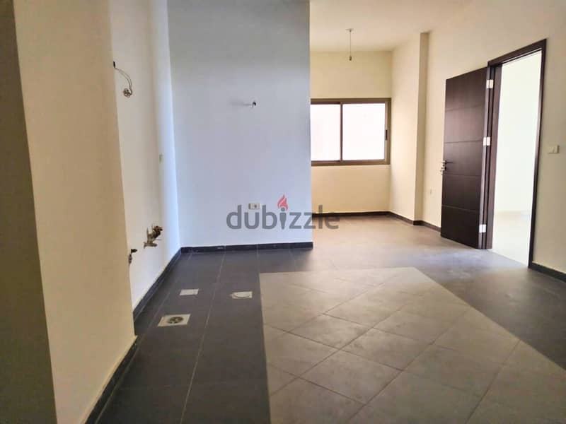 L16109-Spacious Apartment with Terrace For Rent in Dik El Mehdi 2