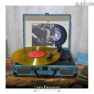 Turntable,  vinyl record player 
مشغل اسطوانات