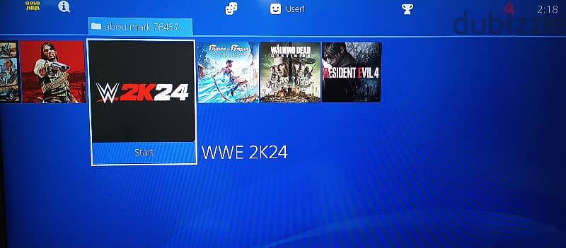 playstation 4 slim with 2 controller and 20 games FC 25 Arabic 15