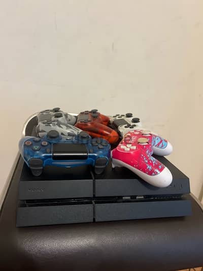 PS4 fat with 5 controllers and 14 games