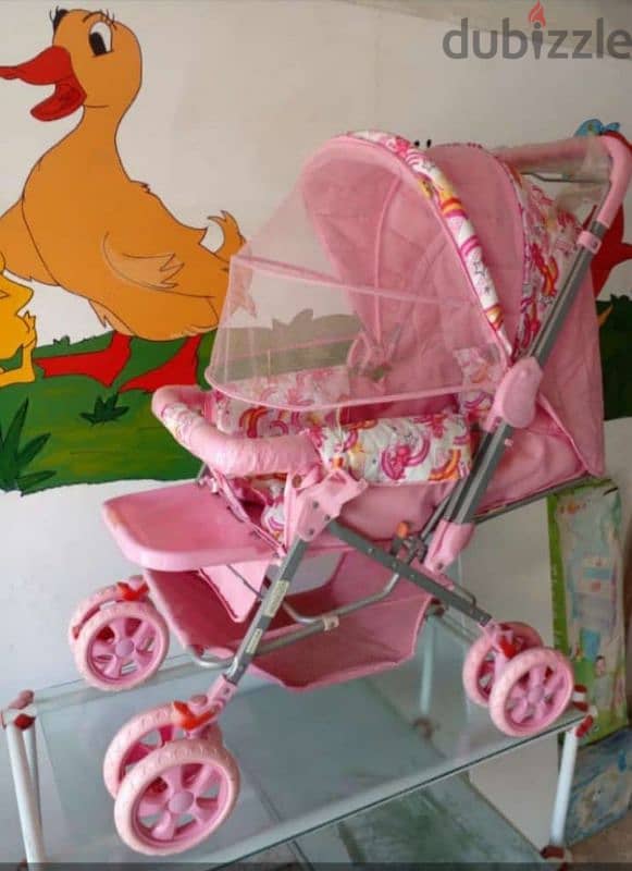 Pink Stroller with Mosquito Net – Stylish & Functional! 1