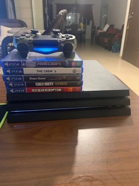 Ps4 pro with 5 cd’s for sale 0