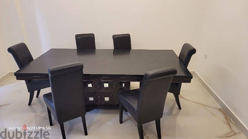 Used Table and 6 chairs in very good condition 1