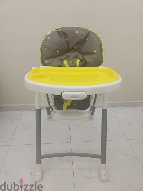 high chair like new 0