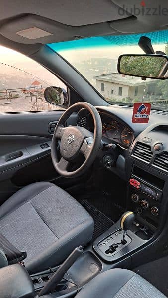 Nissan Sunny 2011 3