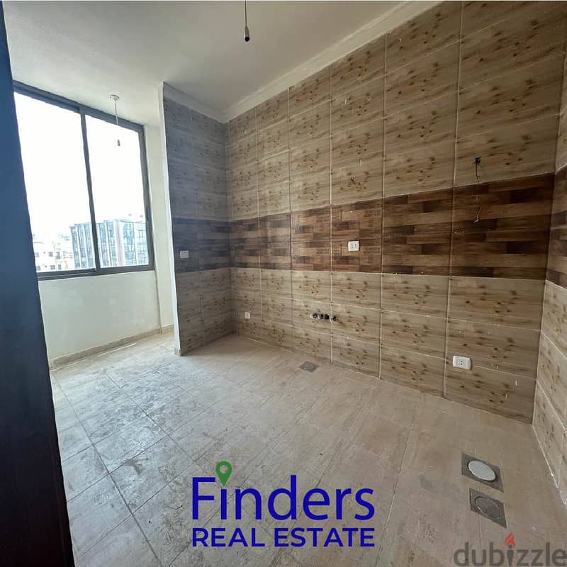 An Apartment For Sale In Sad El Baouchriyeh ! شقة للبيع في سد البوشرية 4