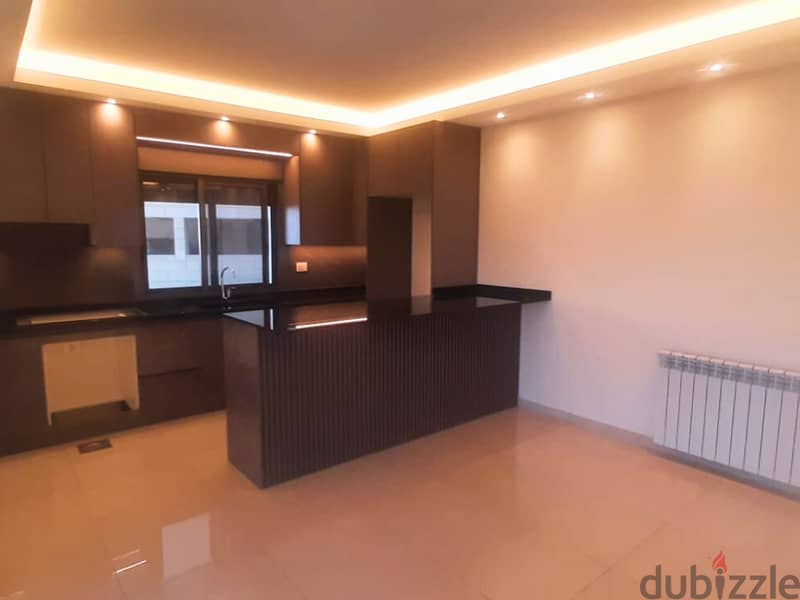 L16201-2-Bedroom Apartment For Sale in Baabdat 1