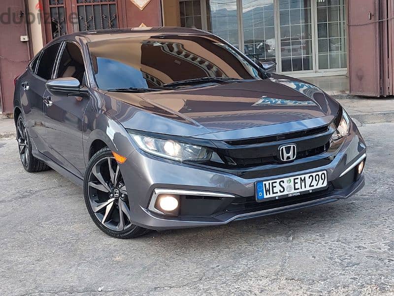 Honda Civic 2019 Sport 60 000 miles tesjila 200$ 1