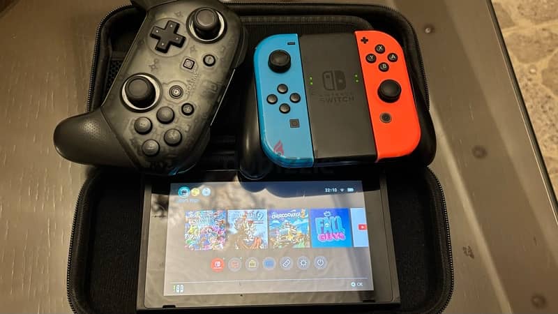 Nintendo switch used like new + games and accessories 3