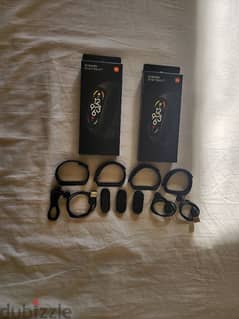 xiaomi smart band 7 mi band 7 and 5 with 4 charger, 4 straps and boxes 0