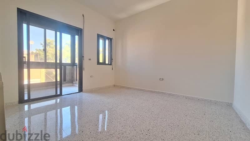 Spacious apartment With big Balcony for rent in Awkar 4