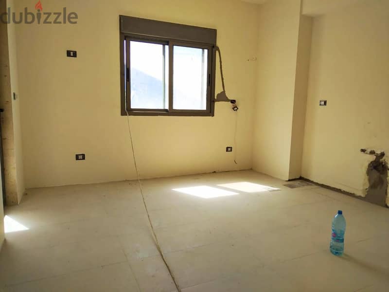 L16241 - Spacious 3-Bedroom Apartment For Sale in Kfarhbeib 2