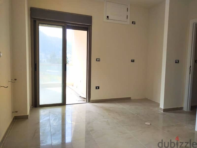 L16241 - Spacious 3-Bedroom Apartment For Sale in Kfarhbeib 3