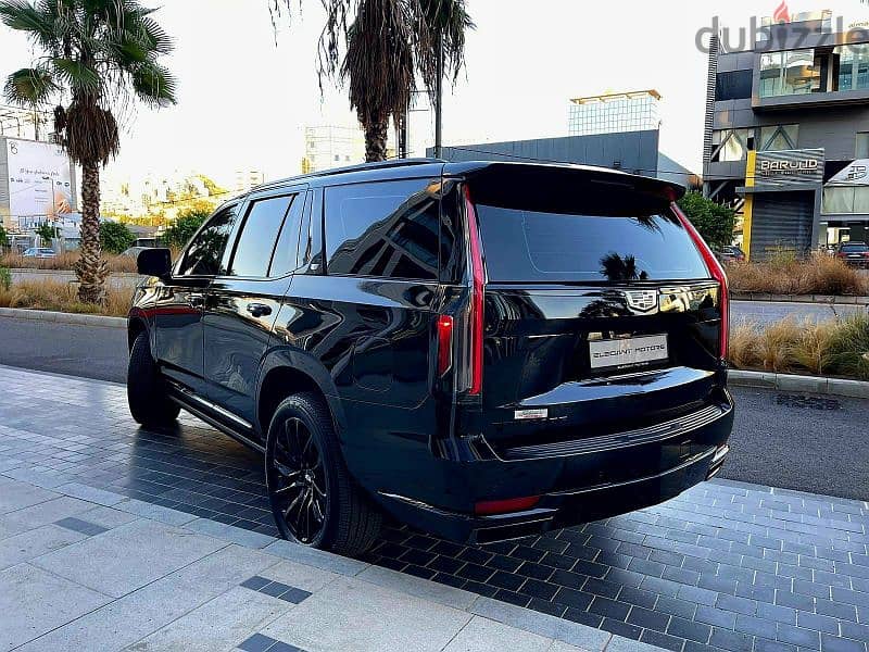 2022 Escalade 600 Sport in sleek black with a luxurious brown interior 5