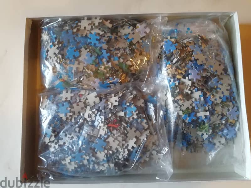 3 puzzles in one box 1000pcs each 48*67cm made in holland 1