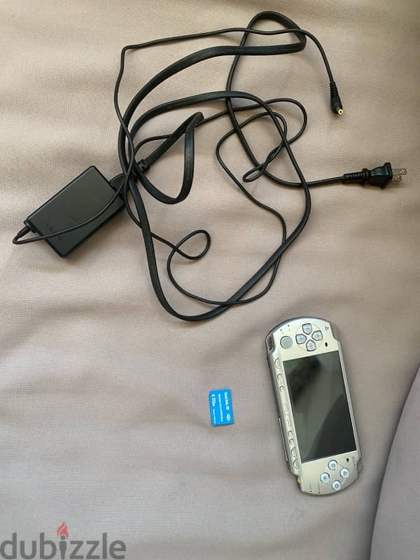 PsP 2000 grey (Used) + memory stick + charger and battery 0