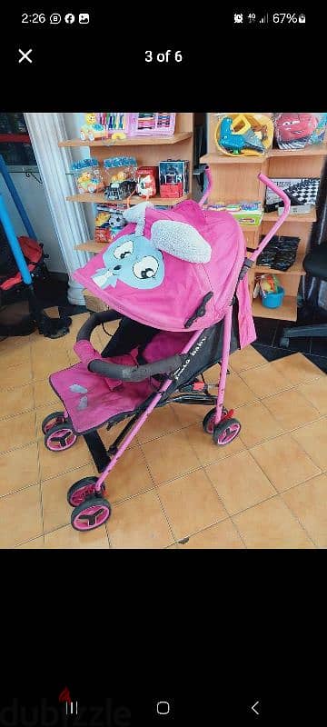 عرباية مستعملة 15$  بتتنيم و خفيفة الوزن ودواليب مناح . . stroller 4