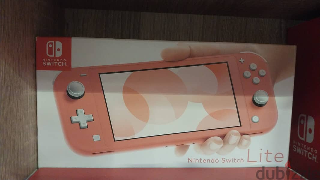 Nintendo switch lite pink original & last offer 0