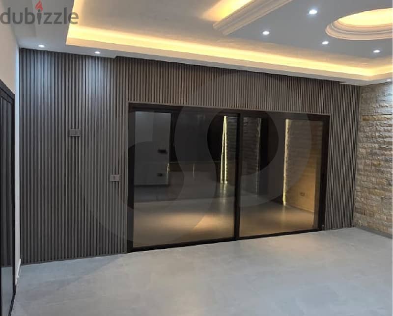 Modern apartment with luxurious finishes in Amchit/عمشيت REF#RS112394 1