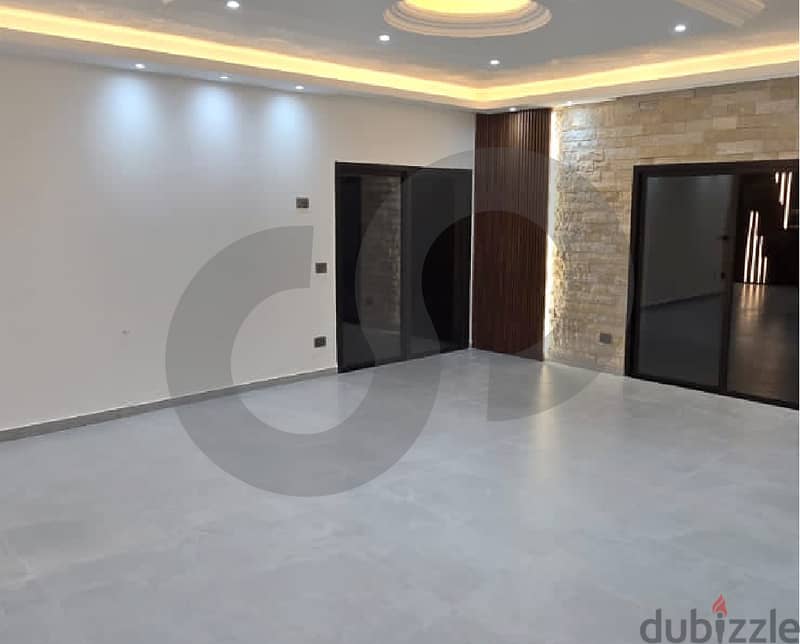 Modern apartment with luxurious finishes in Amchit/عمشيت REF#RS112394 4