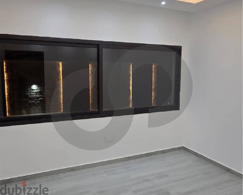 Modern apartment with luxurious finishes in Amchit/عمشيت REF#RS112394 6